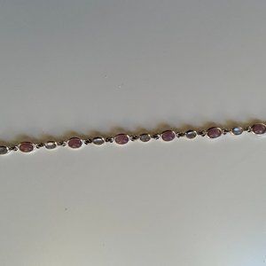 Bracelet;  silver with blue and purple stones.